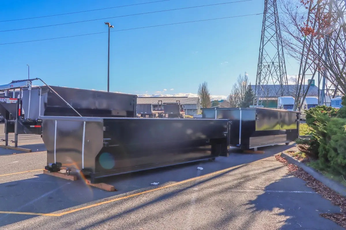 Roll-off dumpster ready for waste disposal at job site for 2 Yard Dumpster Rental in East Bay